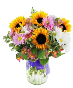 sunflowers and other assorted flowers in a vase